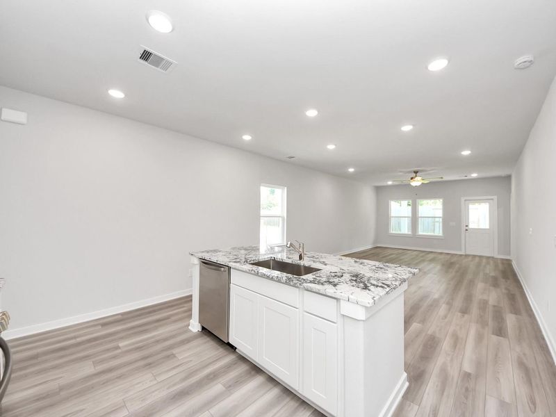 Furnished interior view inside a new home in Windmill Estates, Magnolia (Image 7).