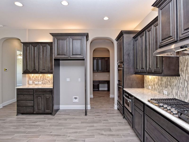 Representative furnished interior of a home built from the San Simeon I by Giddens Homes in Clearwater Ranch, Liberty Hill (Image 237).