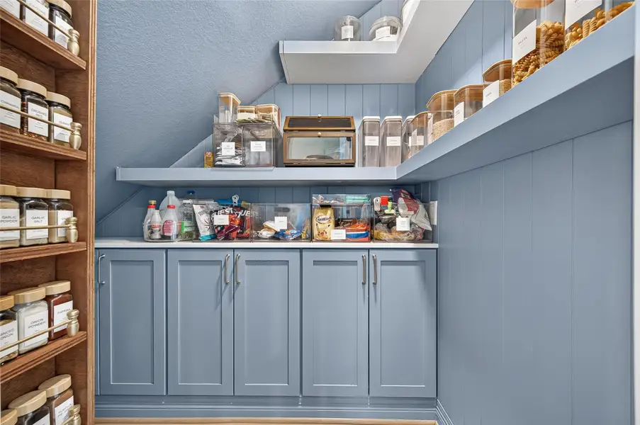 Under stairs turned into pantry.