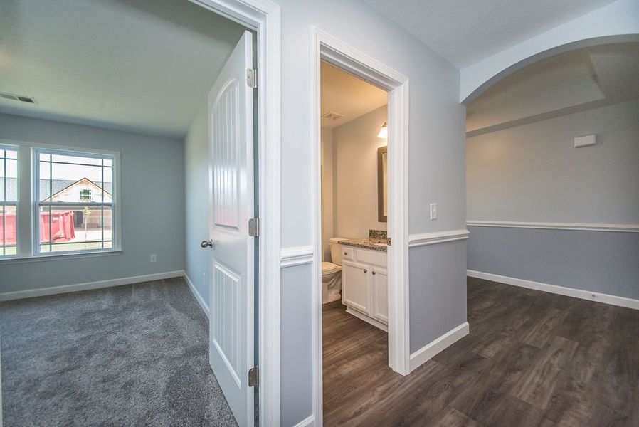 Representative furnished interior of a home built from the Franklin by Enchanted Homes in Guadalupe Heights, Seguin (Image 18).