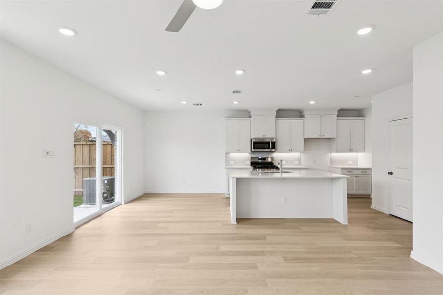 YOur new dining area features a sliding glass door leading directly to your fenced back yard! YOur new dining area features a sliding glass door leading directly to your fenced back yard!