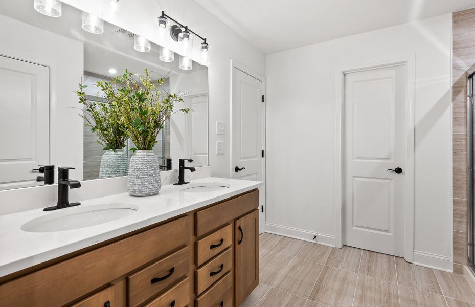 Owner's Bath with Dual Bowl Vanity and Walk-In Shower