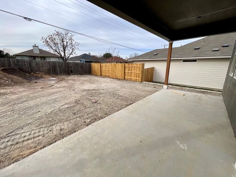 Exterior details and patio area of a home in Covered Bridge, Hutto (Image 3).