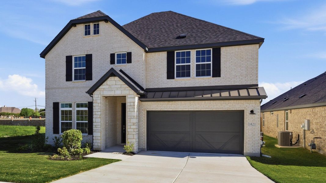 Front exterior of a new home in Green Oaks Preserve, Arlington, TX, highlighting curb appeal (Image 2). Front exterior of a new home in Green Oaks Preserve, Arlington, TX, highlighting curb appeal (Image 2).