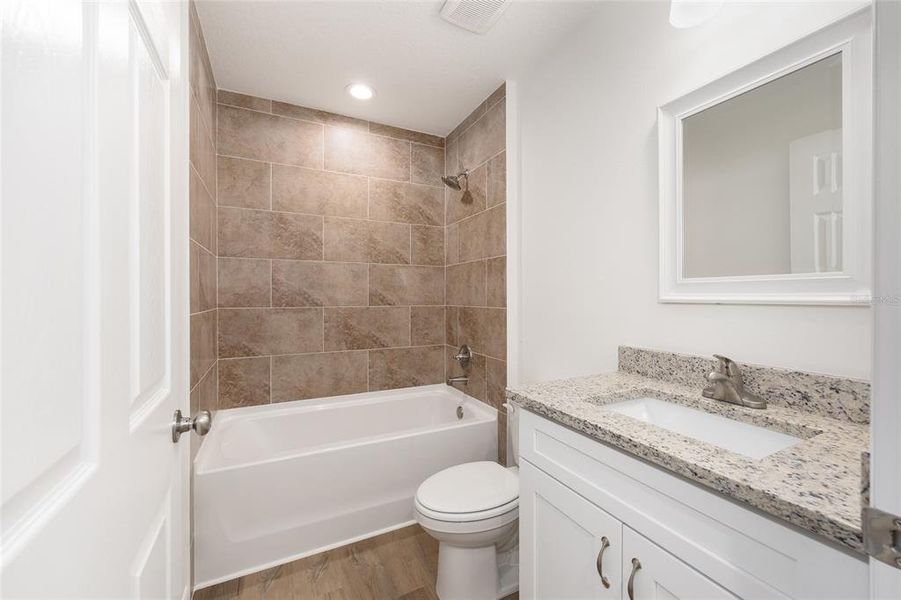 Furnished interior view inside a new home in , Dunnellon (Image 9).