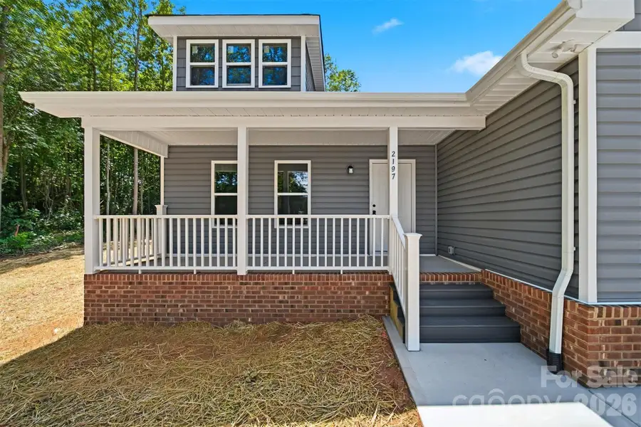 Exterior details and patio area of a home in , Conover (Image 4).