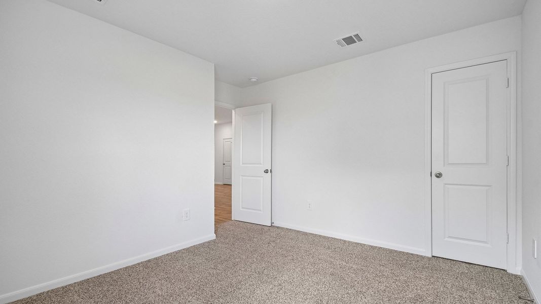 Spacious, unfurnished interior of a new home in Prairie Lakes, Buda (Image 30).