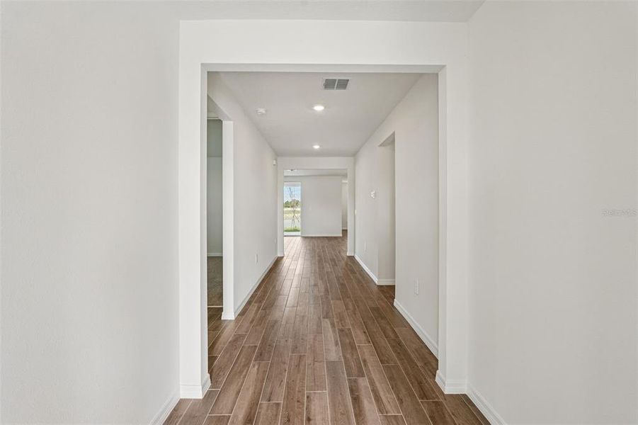 Spacious, unfurnished interior of a new home in Oakfield Trails - Signature Series, Parrish (Image 27).