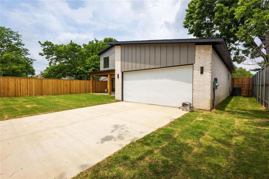 Front exterior of a new home in , Richardson, TX, highlighting curb appeal (Image 23).