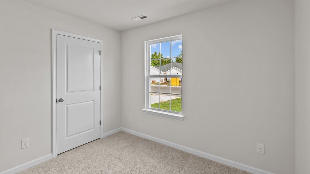 Spacious, unfurnished interior of a new home in Hobbs Farm, Ayden (Image 16).
