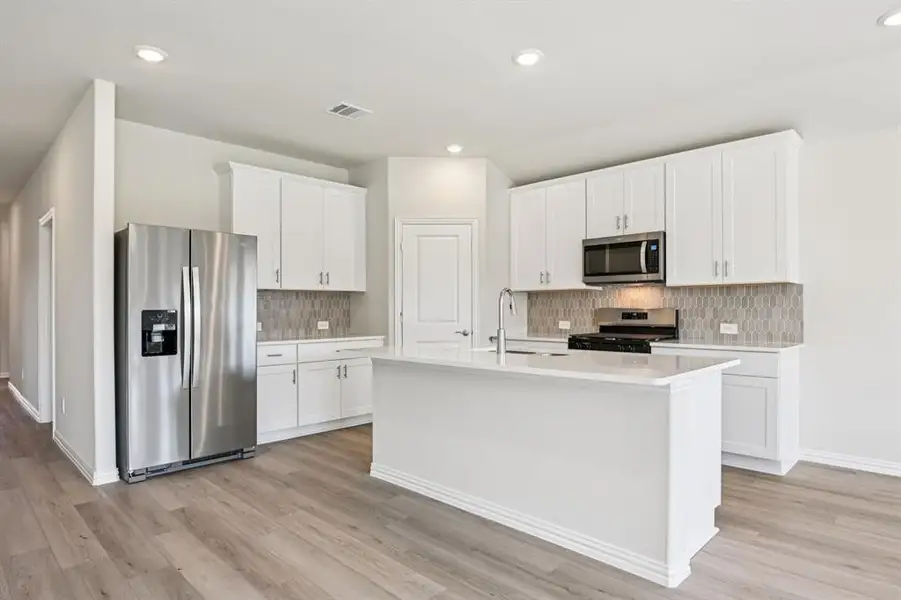 Photo is not of the actual home, but is an inspirational photo of builder’s model home and may depict options, furnishings, and/or decorator features that are not included.