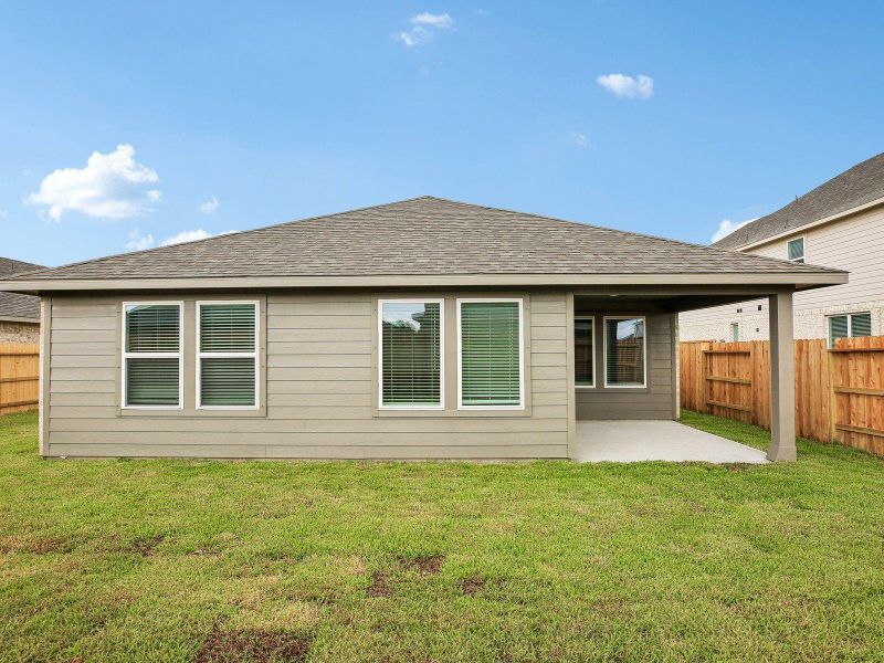 Exterior details and patio area of a home in Heights of Barbers Hill, Baytown (Image 20).