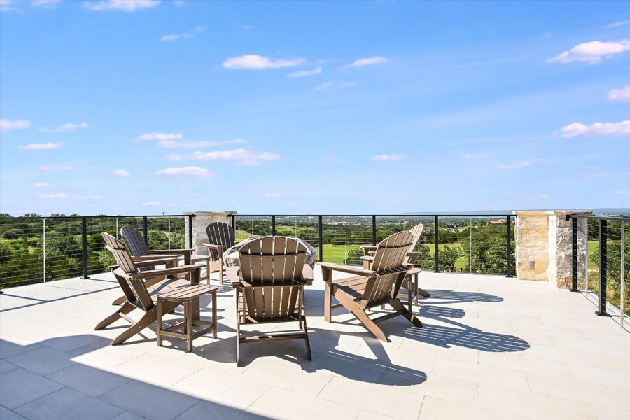 View of patio with a balcony View of patio with a balcony