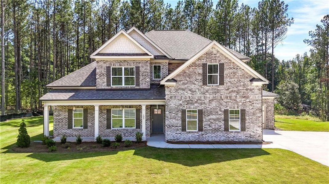 Front exterior of a new home in Palm Springs Manor Create Homes, Ellenwood, GA, highlighting curb appeal (Image 1). Front exterior of a new home in Palm Springs Manor Create Homes, Ellenwood, GA, highlighting curb appeal (Image 1).