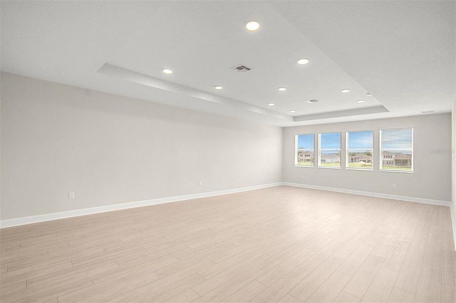 Spacious, unfurnished interior of a new home in Solace at Corner Lake, Orlando (Image 12).