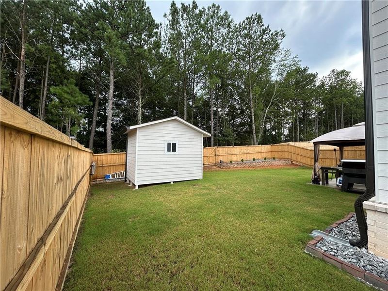Front exterior of a new home in , Loganville, GA, highlighting curb appeal (Image 25).