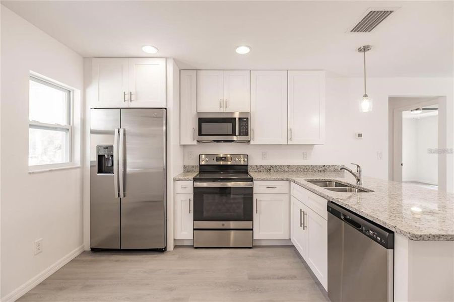 Furnished interior view inside a new home in , Punta Gorda (Image 11).