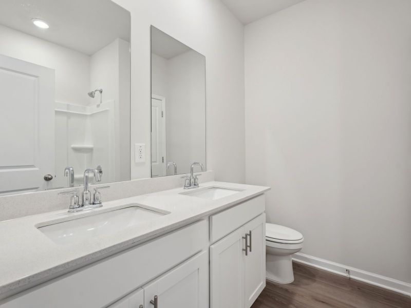 Furnished interior view inside a new home in Northwoods at Mirror Lake, Villa Rica (Image 6).