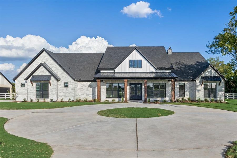 Front exterior of a new home in , McLendon-Chisholm, TX, highlighting curb appeal (Image 1). Front exterior of a new home in , McLendon-Chisholm, TX, highlighting curb appeal (Image 1).