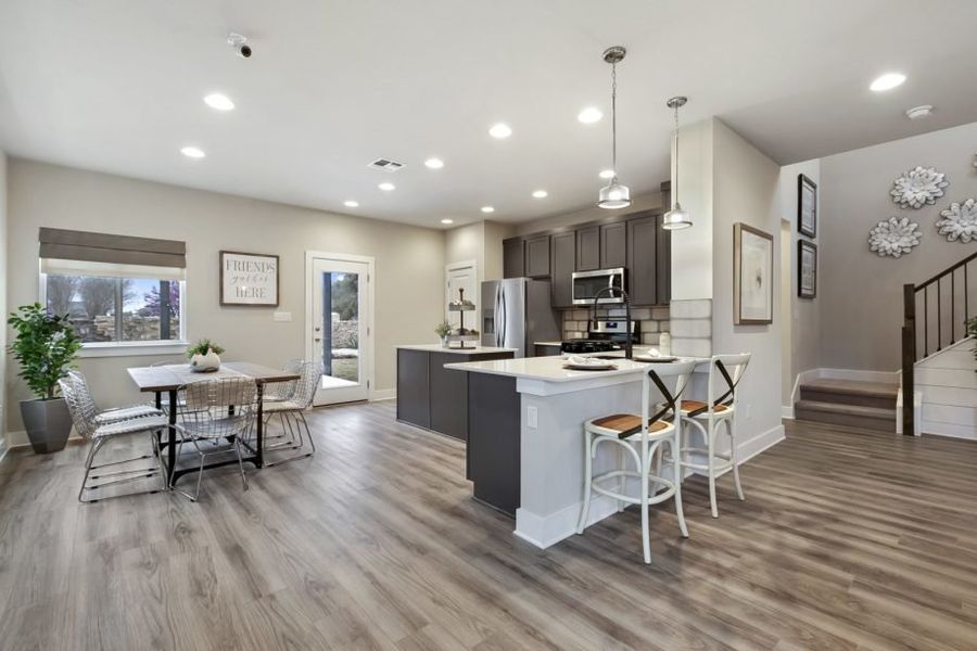 Representative furnished interior of a home built from the Houston by Pacesetter Homes in Village At Manor Commons, Manor (Image 10).