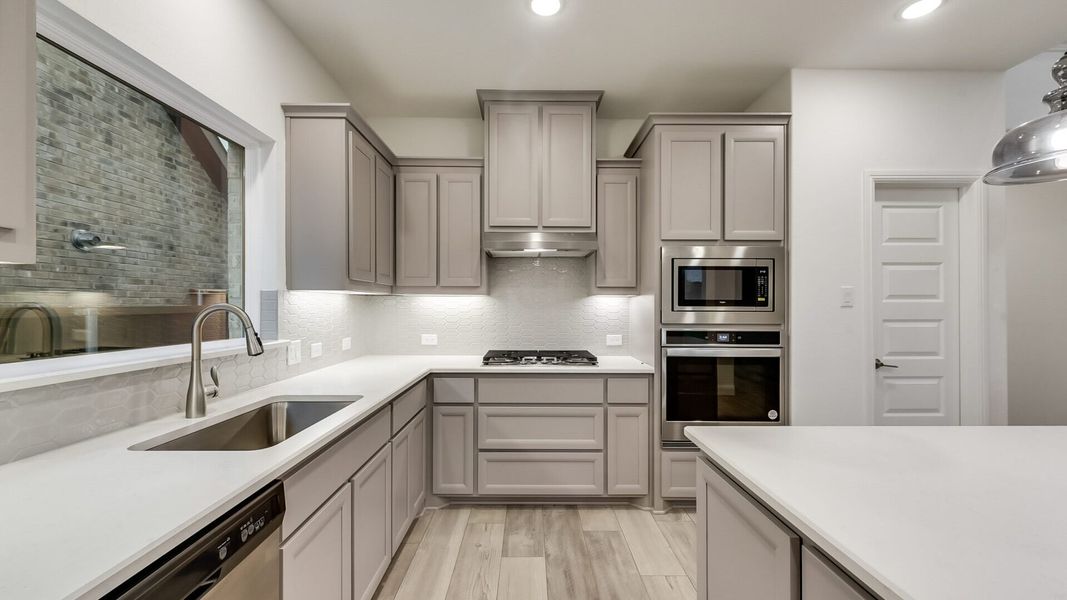 Furnished interior view inside a new home in Creekview Meadows, Pilot Point (Image 9).