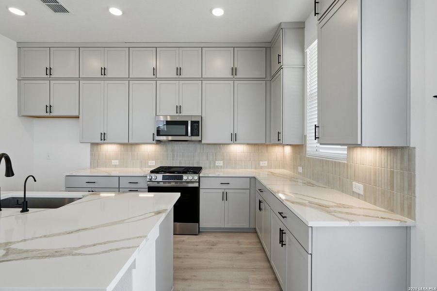 Furnished interior view inside a new home in Prominence, San Antonio (Image 8).