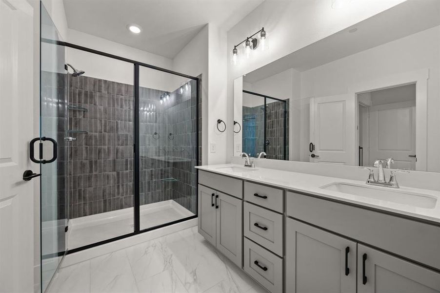 With space for two and an oversized walk in shower, this owner's bath won't disappoint!