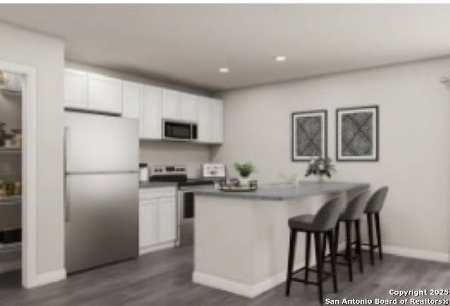 Furnished interior view inside a new home in Las Colinas, Kenedy (Image 6).