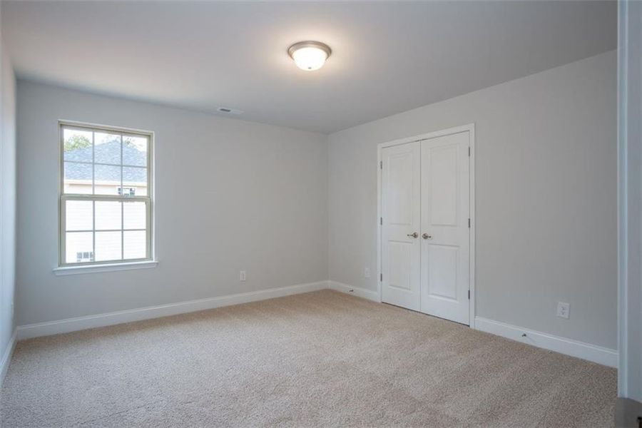 Spacious, unfurnished interior of a new home in Mirror Lake at South Harbour, Villa Rica (Image 17).