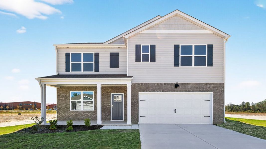 Front exterior of a new home in Martin Farms, Aberdeen, NC, highlighting curb appeal (Image 1). Front exterior of a new home in Martin Farms, Aberdeen, NC, highlighting curb appeal (Image 1).