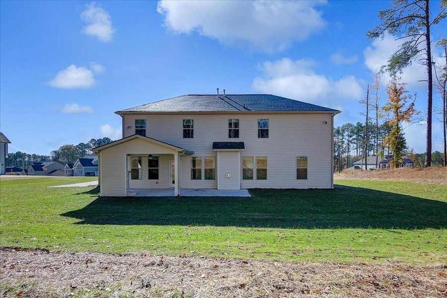 Exterior details and patio area of a home in Riverbend Overlook, Fayetteville (Image 4).