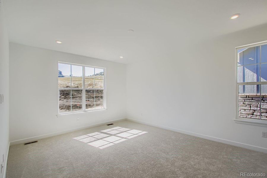 Spacious, unfurnished interior of a new home in Ken-Caryl Ranch: The Monarch Collection, Littleton (Image 6).