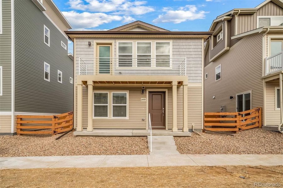 Exterior details and patio area of a home in Reunion, Commerce City (Image 23).
