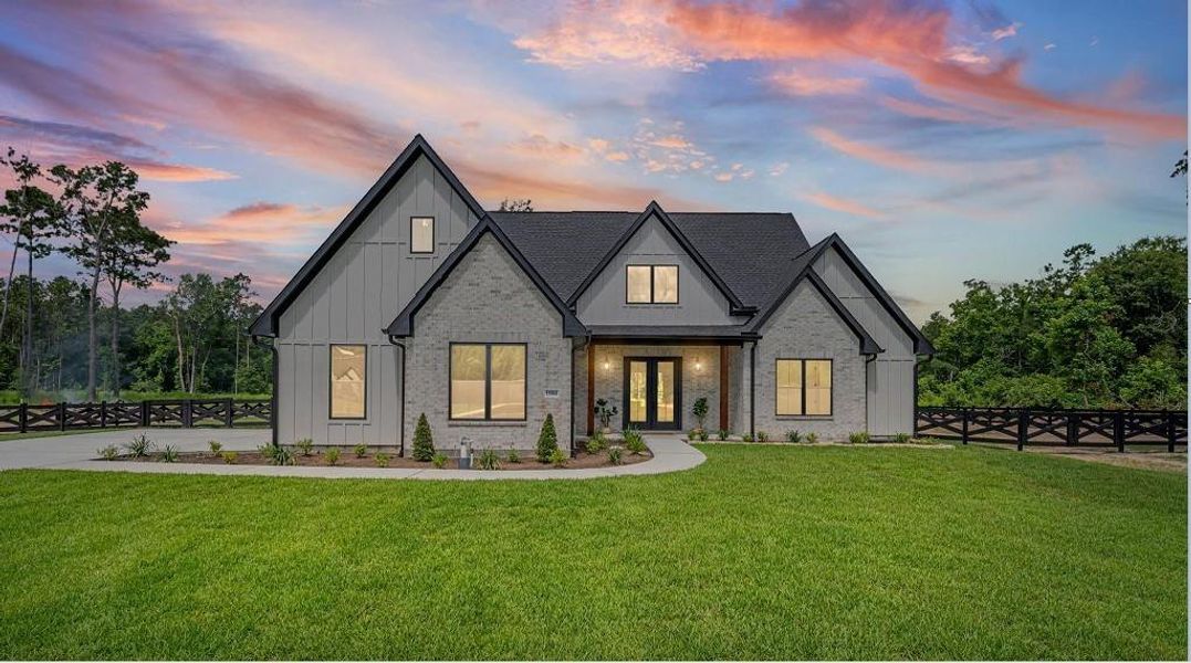 Front exterior of a new home in , Conroe, TX, highlighting curb appeal (Image 26). Front exterior of a new home in , Conroe, TX, highlighting curb appeal (Image 26).