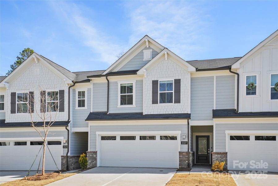 Front exterior of a new home in Galloway Towns, Charlotte, NC, highlighting curb appeal (Image 21). Front exterior of a new home in Galloway Towns, Charlotte, NC, highlighting curb appeal (Image 21).