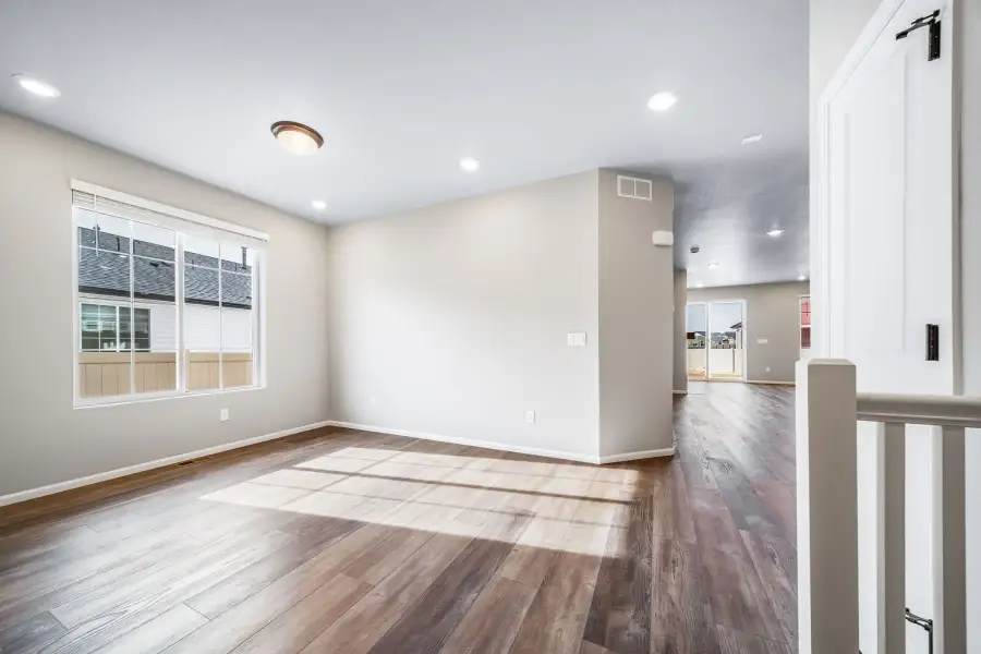 Spacious, unfurnished interior of a new home in The Reserve at Green Valley Ranch, Aurora (Image 17).