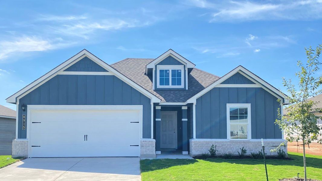 Front exterior of a new home in Mesa Ridge, Temple, TX, highlighting curb appeal (Image 1).