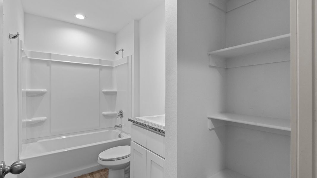 Representative furnished interior of a home built from the The Elgin by D.R. Horton in Allen Farms, Lubbock (Image 7).