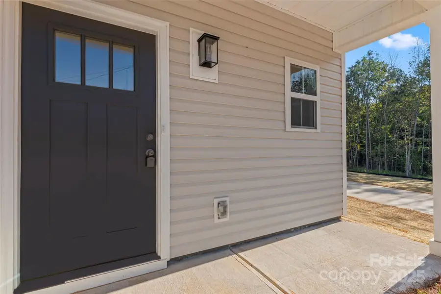 Front exterior of a new home in , Albemarle, NC, highlighting curb appeal (Image 1). Front exterior of a new home in , Albemarle, NC, highlighting curb appeal (Image 1).