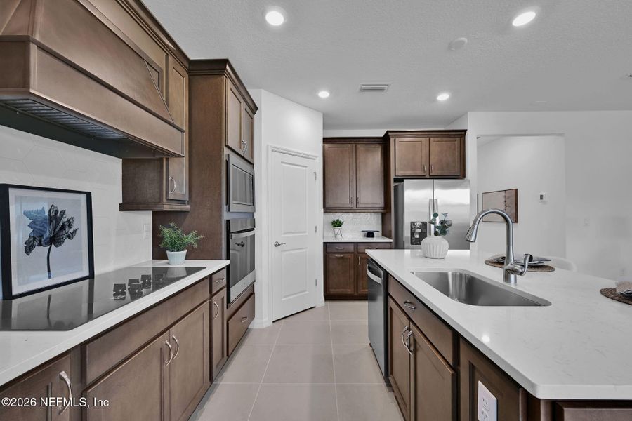 Furnished interior view inside a new home in Hyland Trail, Green Cove Springs (Image 8).
