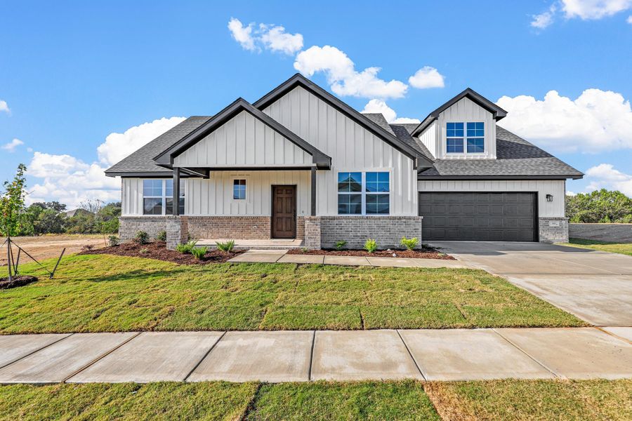 Representative exterior photo of a completed home built from the Garrison II by Cheldan Homes in Stoneview, Glen Rose, TX (Image 26).