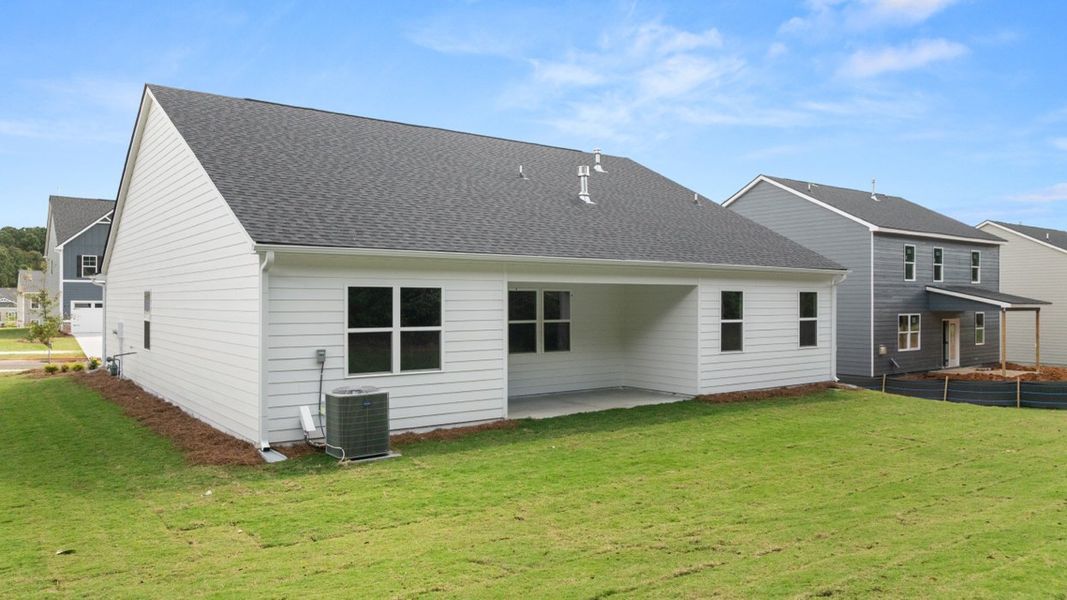 Exterior details and patio area of a home in Preserve at Dove Creek, Statham (Image 20).