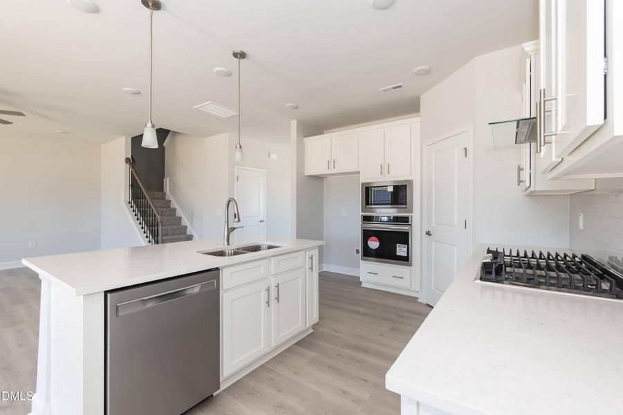 Furnished interior view inside a new home in Hidden Pines, Cameron (Image 6).