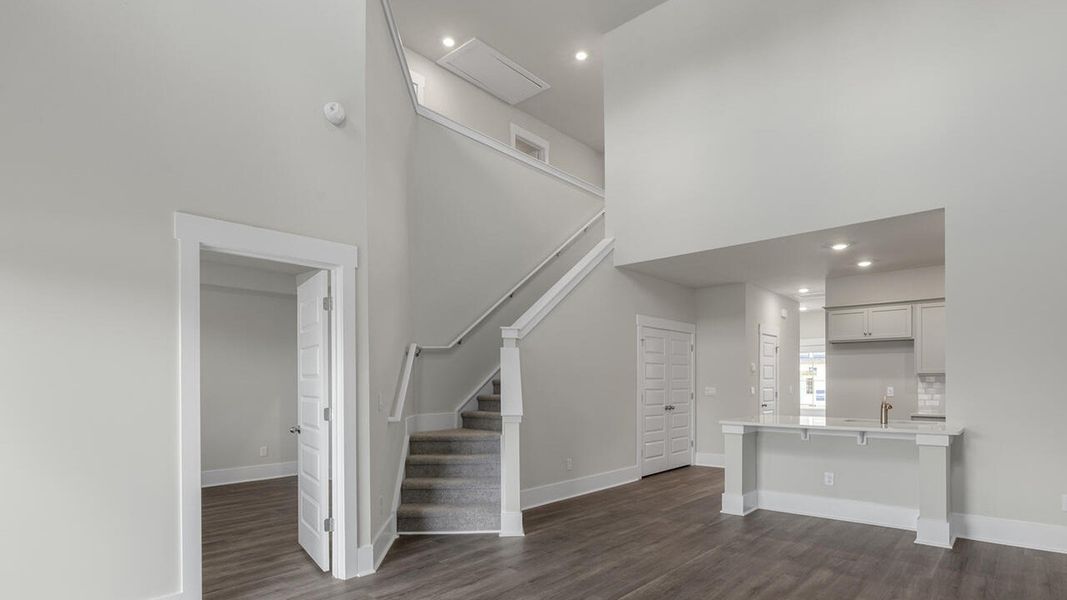 Spacious, unfurnished interior of a new home in The Palms at Indigo Preserve Townhomes, Leland (Image 15). Spacious, unfurnished interior of a new home in The Palms at Indigo Preserve Townhomes, Leland (Image 15).