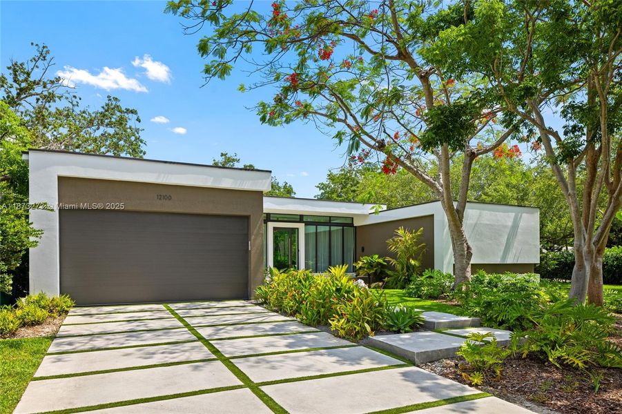 Front exterior of a new home in , Pinecrest, FL, highlighting curb appeal (Image 36).