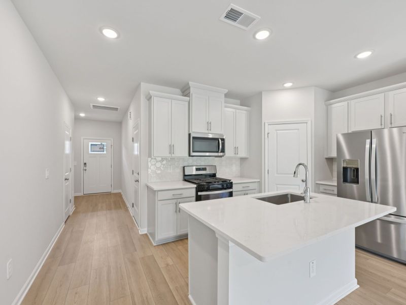 Furnished interior view inside a new home in Oakwood Townes, Mebane (Image 3).
