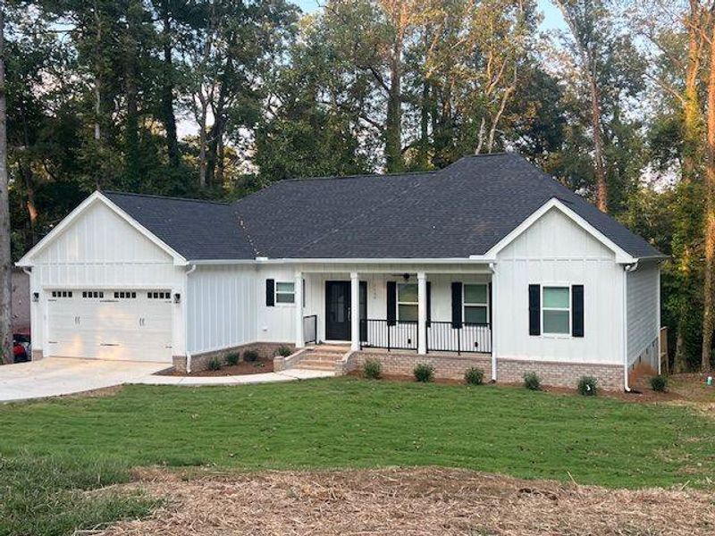 Front exterior of a new home in , Griffin, GA, highlighting curb appeal (Image 18).