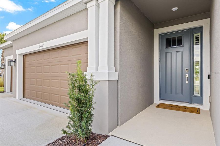 Exterior details and patio area of a home in Tiburon, Nokomis (Image 25).