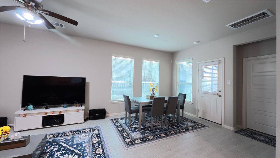 Furnished interior view inside a new home in Sunterra, Katy (Image 9).