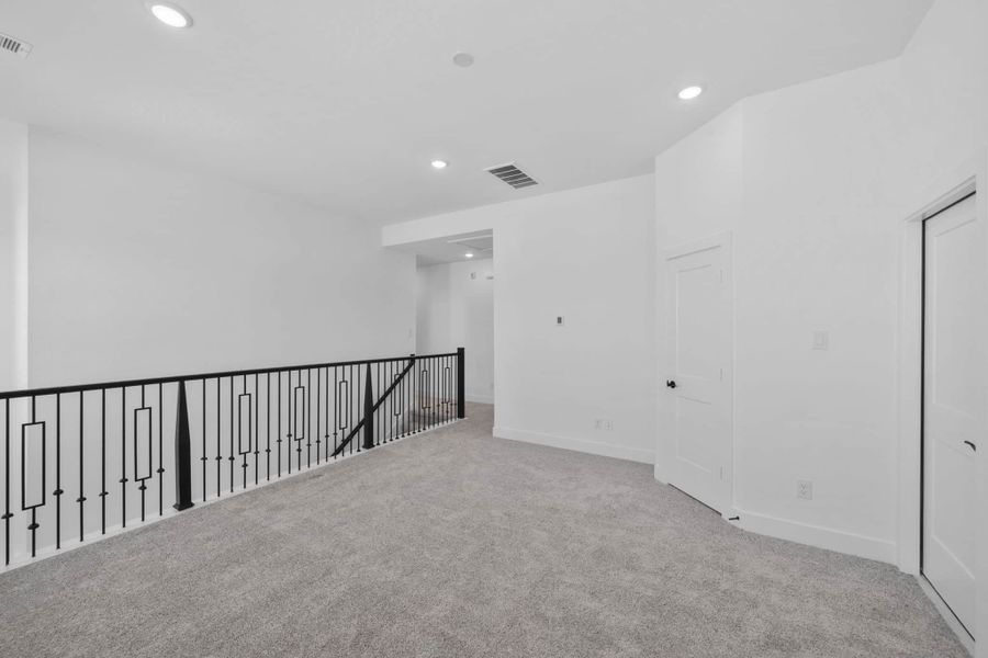 Spacious, unfurnished interior of a new home in Meridiana, Manvel (Image 24).